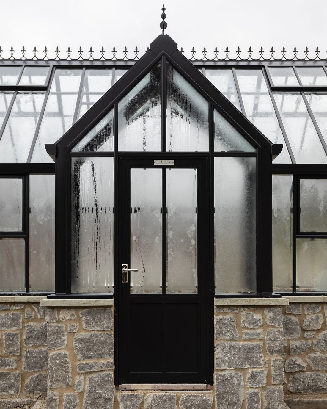 Should You Add a Glass Greenhouse to Your Garden?