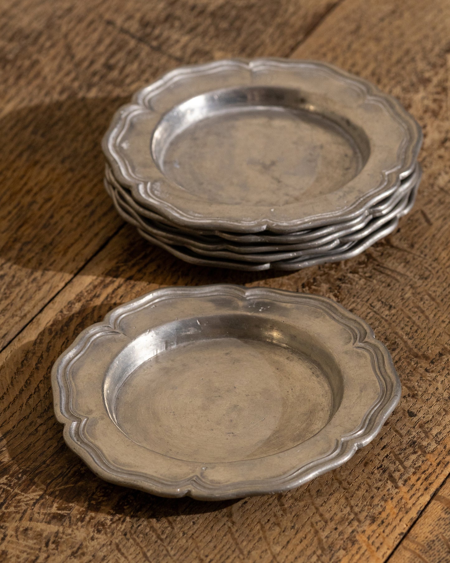 Set of Six Sculpted Pewter Coasters — Signed Nino Ferrari