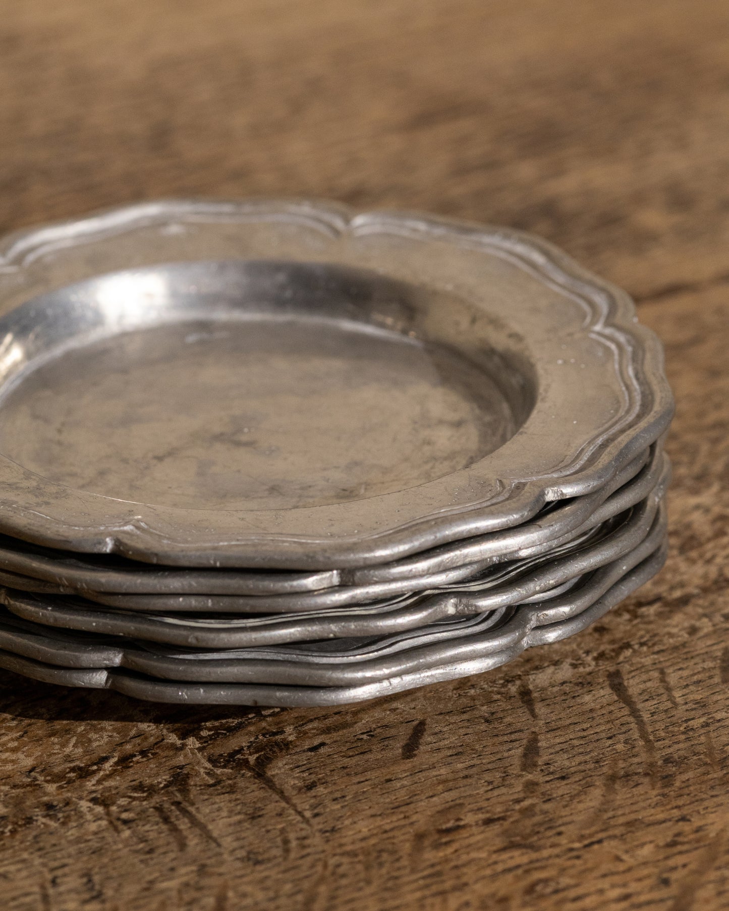 Set of Six Sculpted Pewter Coasters — Signed Nino Ferrari