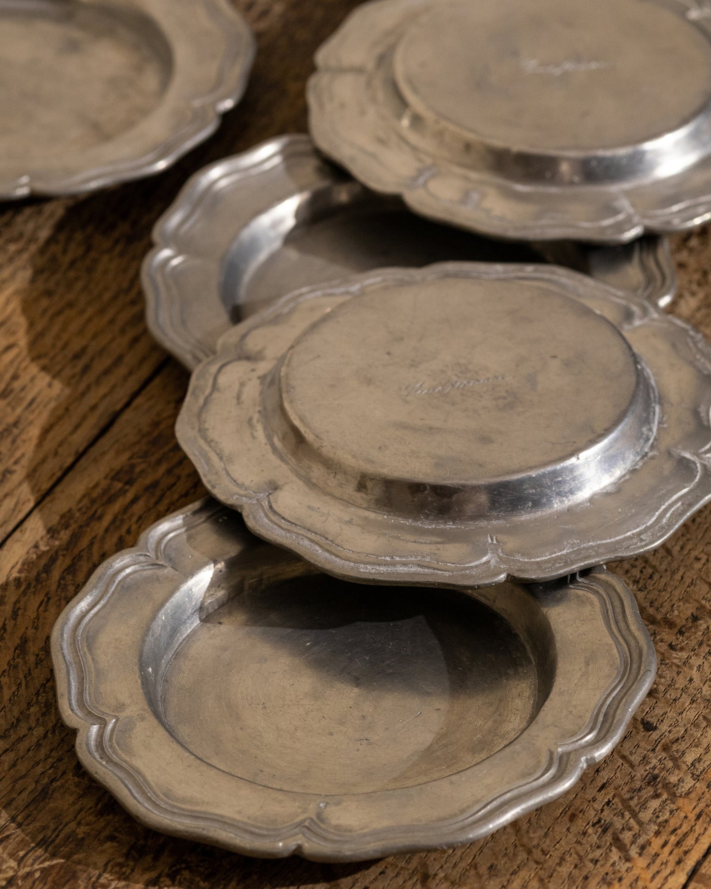 Set of Six Sculpted Pewter Coasters — Signed Nino Ferrari